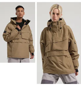 Close-up of khaki waterproof ski jacket with functional pockets and windproof cuffs