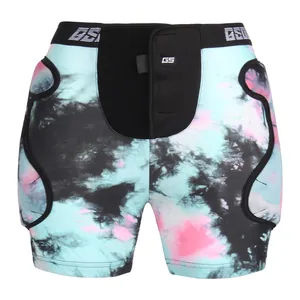 Protective padded shorts with blue and pink tie-dye pattern for skiing and skating
