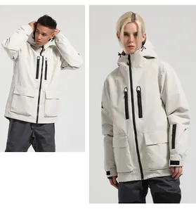 Detail of waterproof ski jacket with hooded design, zipper pockets and velcro cuffs