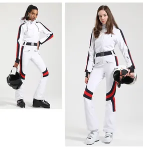 Front and side view of white slim-fit ski suit with red and blue side stripes and belt
