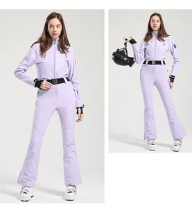 Detail of light purple slim-fit one-piece ski suit with black waist belt and windproof cuffs