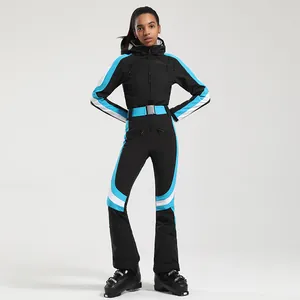Women's slim fit one-piece ski suit in black blue and white with hood and waist belt