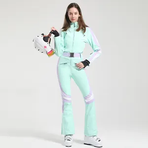 Slim-fit mint green and lavender women's one-piece ski suit with belt and pockets