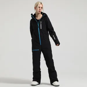 Women's black one-piece ski suit with blue waterproof zippers and functional pockets