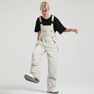 Women's light grey waterproof insulated ski bib overalls for winter outdoor snowboarding