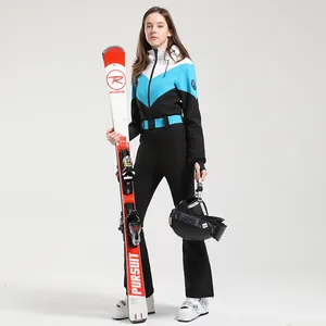 Combinaison de ski une pièce pour femme noir et bleu avec ceinture réglable et capuche