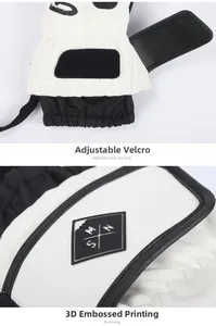 Dettaglio del cinturino in velcro regolabile e logo 3D sui guanti da sci professionali