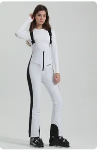 Detail of waterproof ski overalls for women with adjustable straps and zipper pockets