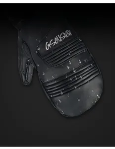 Close-up of waterproof winter ski mittens showing water droplets on the surface