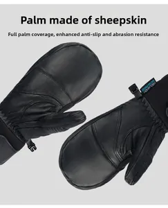 Detail of sheepskin leather palm and waterproof buckle on black winter ski gloves