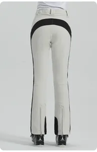 Vista posteriore dei pantaloni da sci termici da donna con giunzioni grigio-nere