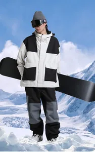 Waterproof ski jacket and pants set with windproof hooded design for mountain sports