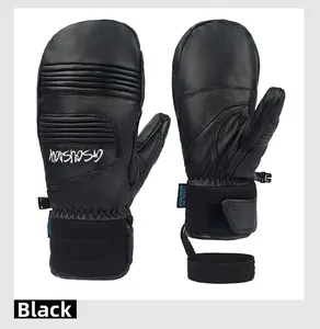 Detail of black waterproof ski mittens with non-slip leather palm and wrist straps