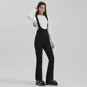 Women's black waterproof ski bib pants with adjustable straps for winter outdoor sports