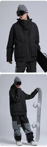 Detail of men's waterproof ski suit with functional pockets and contrast stitching