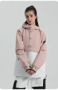 Close-up of pink and white hooded ski jacket with black buttons and arm badge detail