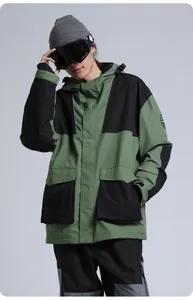 Detail of waterproof ski jacket with olive and black contrast stitching and large pockets