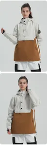 Detail of waterproof ski anorak with cream and mustard yellow color-block design