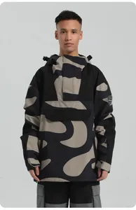 Detail of hooded camo ski anorak with front pouch pocket and adjustable cuffs