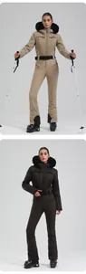 Close-up of women's professional ski set with quilted hooded jacket and faux fur trim