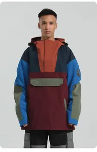 Detail of waterproof color-block ski anorak with front flap pocket and arm patch