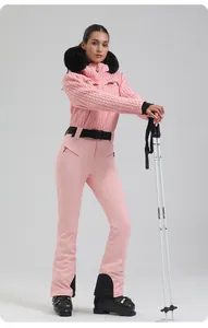 Women's pink quilted ski suit set with faux fur hood and adjustable belt for outdoors