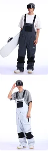 Detail view of durable snowboard bib pants with adjustable straps and cargo pockets