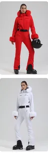 Detail of slim-fit hooded ski jumpsuit featuring plush faux fur trim and adjustable waist belt