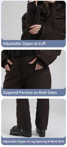 Détail de la combinaison de ski avec poignets réglables et poches zippées étanches