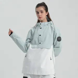 Women's blue and white waterproof hooded ski jacket with front pocket and sleeve badge