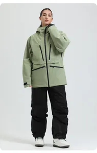 Green hooded waterproof ski jacket and black pants set for professional women athletes