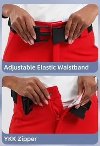 Detail of red ski pants featuring an adjustable elastic belt and quality YKK zipper closure