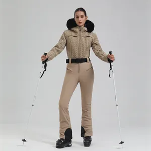 Women's professional beige ski suit set with woven texture jacket and warm faux fur collar