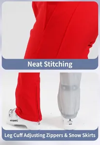 Detail of red ski pants featuring durable stitching and adjustable zipper leg with snow gaiter