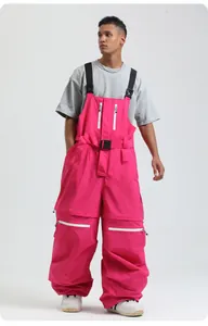 Fluoreszierende pinke Skilatzhose mit verstellbaren Trägern und Reißverschlusstaschen