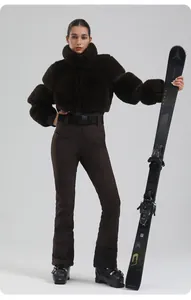 Deep brown faux fur ski jacket with slim-fit pants and matching waist belt for women