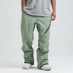 Waterproof sage green ski pants for men featuring windproof fabric and side zipper pockets