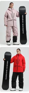 Close-up of waterproof zipper pockets and reinforced hem on professional ski jacket