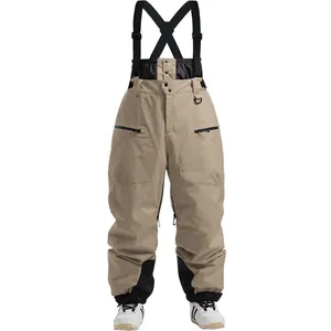 Waterproof insulated khaki ski bibs with adjustable straps and reinforced inner leg panels