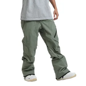 Waterproof olive green ski pants for men featuring zipper pockets and reinforced cuffs