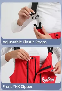 Détail des bretelles élastiques réglables et du zip YKK sur le pantalon de ski rouge
