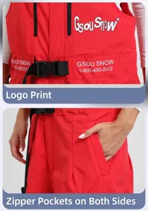 Détail du pantalon de ski rouge avec logo de la marque, boucle et poches zippées