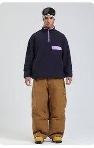 Détails du pantalon de ski imperméable jaune terre avec pull polaire de sport