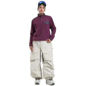 Winter waterproof purple fleece pullover and white cargo ski pants outdoor sports set
