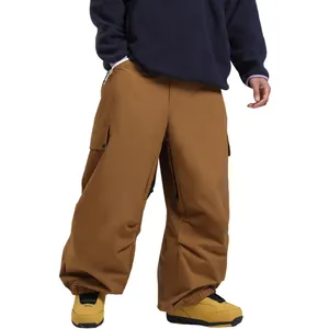 Men's brown loose fit waterproof ski pants with multi-pocket cargo design for outdoor