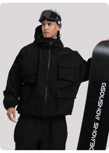 Close-up of black hooded ski jacket featuring multi-pocket utility design and windproof fabric