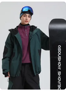 Detail of dark green and black hooded ski jacket with adjustable cuffs and purple fleece