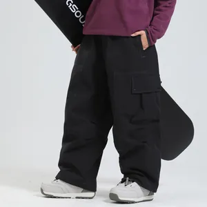 Pantalon de ski noir imperméable avec poches cargo pour les sports d'hiver