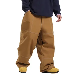 Waterproof wide-leg ski pants in camel with contrast stitching for men and women