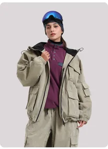 Close-up of beige corduroy hooded ski jacket with fleece lining and cargo pockets